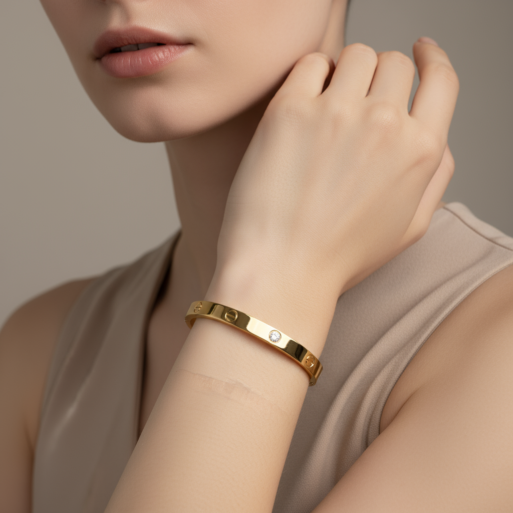 Elegant Gold-Plated Screw Detail Bangle Bracelet with Sparkling Cubic Zirconia Accents