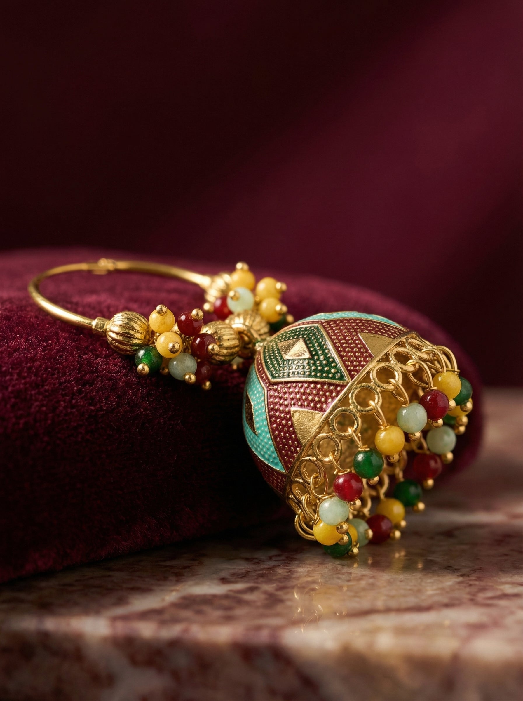 Decorative bangles with beads on a textured surface